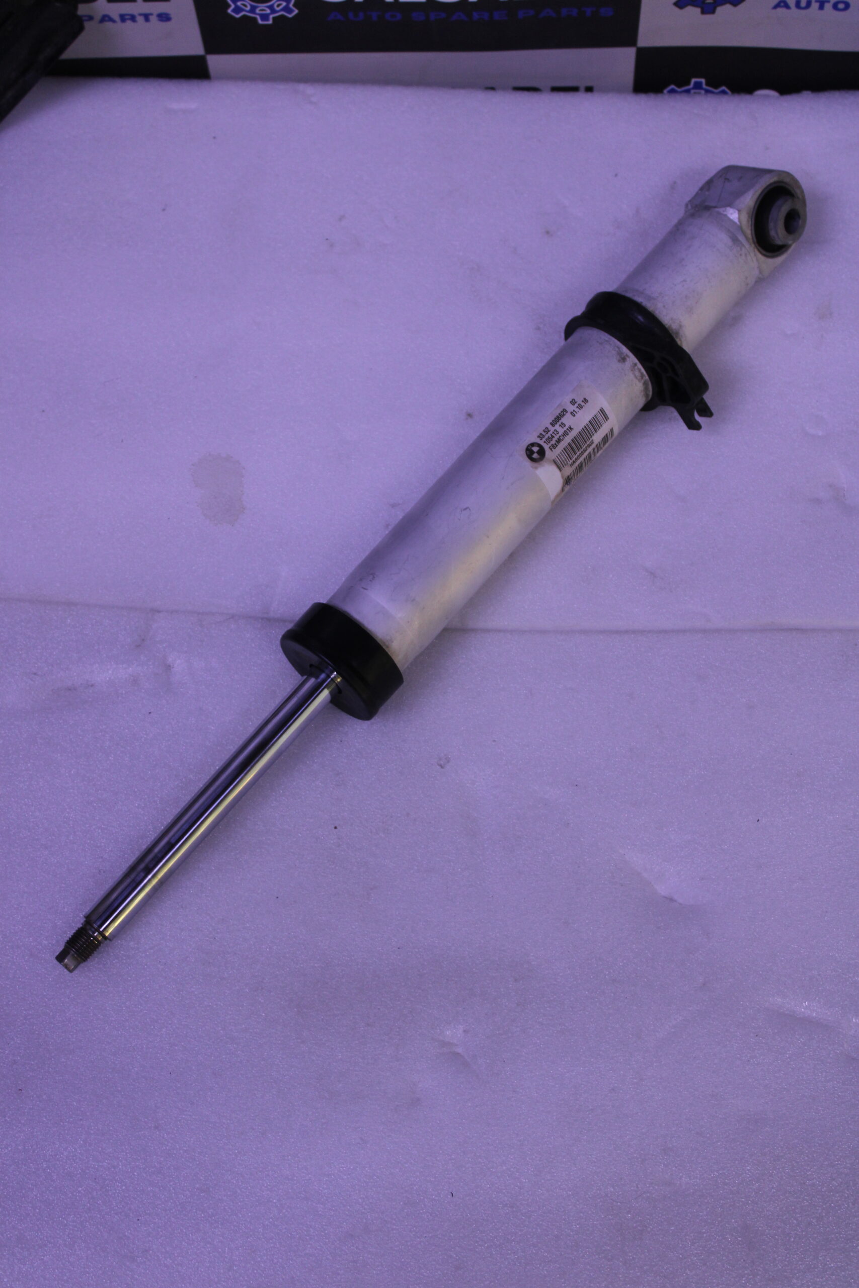 BMW Shock absorber EDC rear left 33528008629